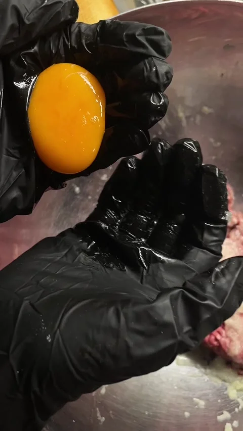 Kitchen environment depicting precise and sanitary food handling techniques Stock Footage 341672728