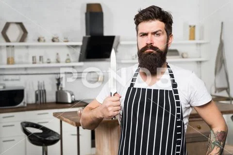 Kitchen equipment. culinary business. tasty cuisine. serious and confident chef Stock-Fotos