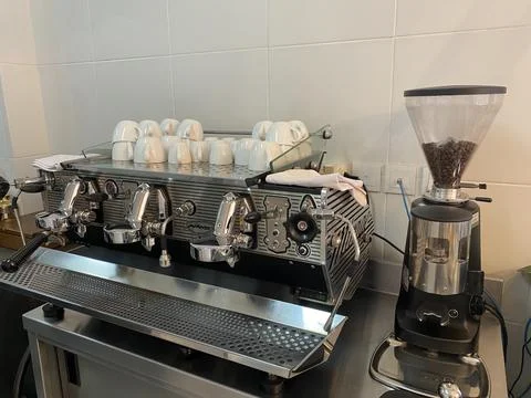 Kitchen with espresso machine and coffee bean grinder Stock Photos