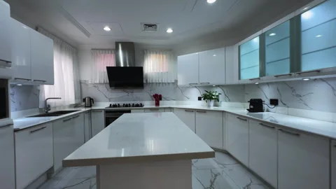 Kitchen in an expensive private villa in Dubai. Lighting from the windows during Stock Footage 272813068