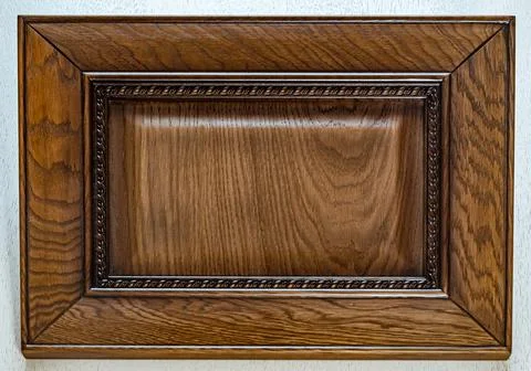 Kitchen facade made of solid oak covered with brown lacquer. wood background Stock-Fotos