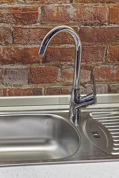 Kitchen faucet stainless Stock Photos
