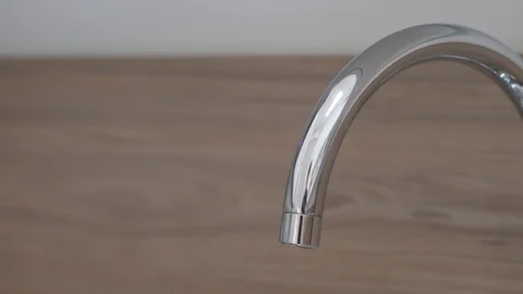 Kitchen faucet tracking shot Stock Footage 128977357