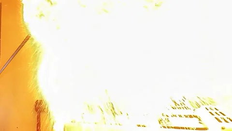 Kitchen fire safety hazard, firefighter demonstrating oil fire explosion with Stock Footage 337724385