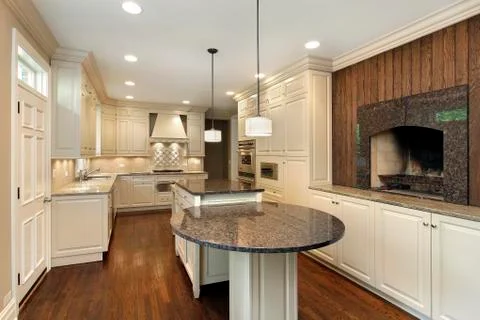 Kitchen with fireplace Stock Photos