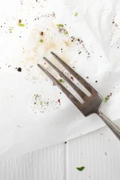 Kitchen fork on grungy paper Stock Photos