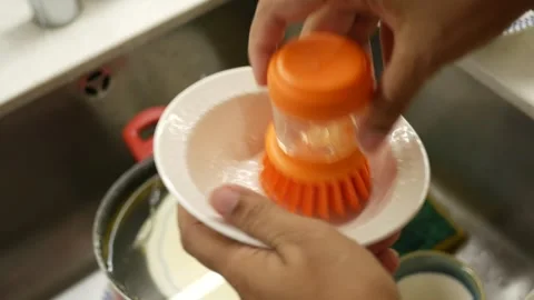 This kitchen gadget makes drying dishes more efficient and easier Stock Footage 293887402