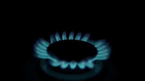 Kitchen gas burners in the dark Stock Footage 73950345