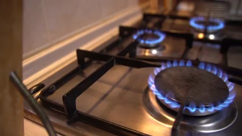 Kitchen gas cooker with burning fire propane gas.Blue natural Gas Flame Stock Footage 159278257