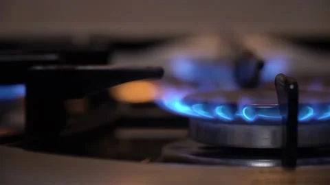 Kitchen gas cooker with burning fire propane gas.Blue natural Gas Flame Stock Footage 159278347