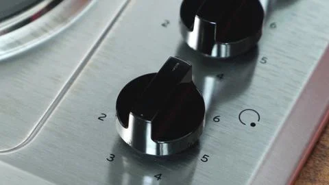 Kitchen gas stove Knobs close up. Stock Photos