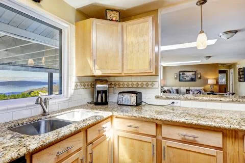 Kitchen with granite counter tops Stock Photos