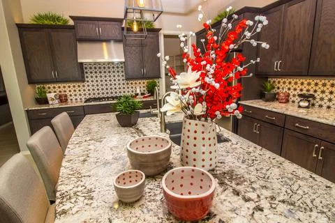 Kitchen With Granite Counters And Decorative Items Stock Photos