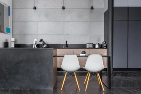 Kitchen with grey wall tiles Stock Photos