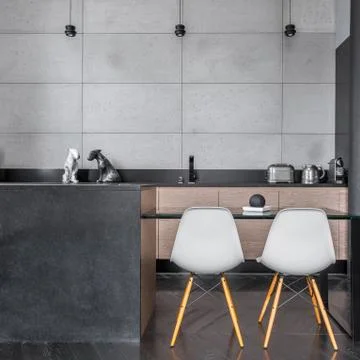 Kitchen with grey wall tiles Stock Photos