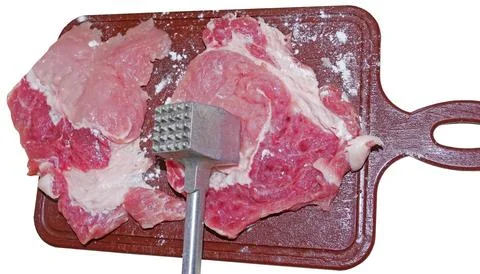 Kitchen hammer for beating meat Stock Photos