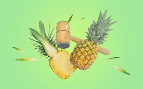 Kitchen hammer breaks the pineapple into pieces. Creactive conceptual composi Stock Photos