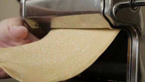 Kitchen helper machine for pasta 4K 2160p 30fps UltraHD footage - Close-up of Stock Footage 77753350