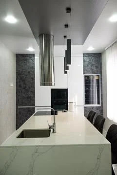 Kitchen in the house. Work surface and refrigerator. Stock Photos