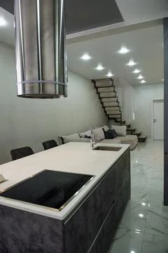 Kitchen in the house. Work surface and refrigerator. Stock Photos