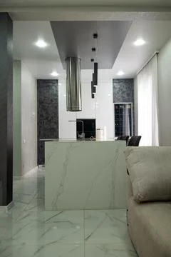 Kitchen in the house. Work surface and refrigerator. Stock Photos