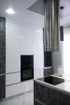 Kitchen in the house. Work surface and refrigerator. Stock Photos