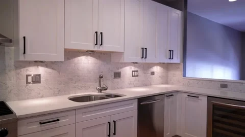 Kitchen interior design with white cabinets, backsplash and countertops Vídeos de archivo 209683790