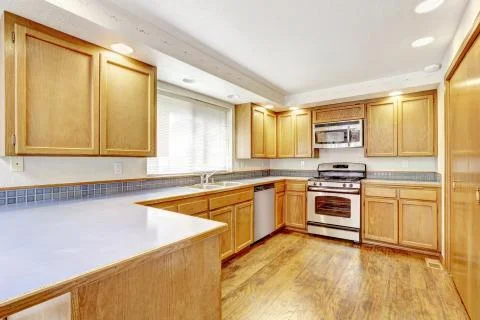 Kitchen interior in empty house Stock Photos