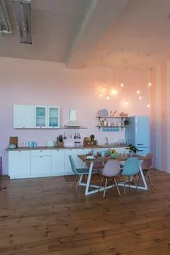 Kitchen interior with large dining table Photos