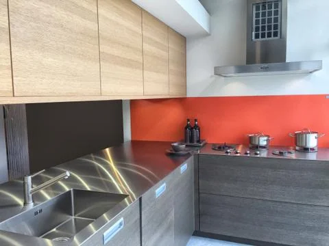 Kitchen interior in red and stainless steel Stock Photos