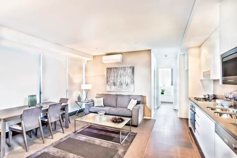 Kitchen interior with sofa set and ceramics. Stock Photos