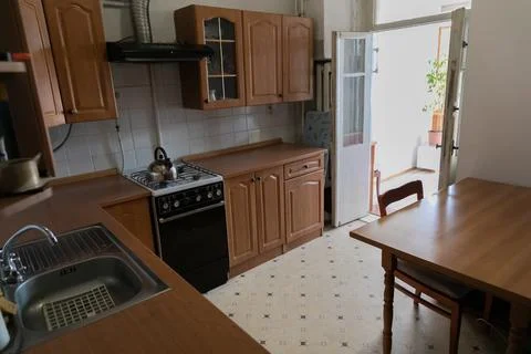 Kitchen interior with stove and table 스톡 사진