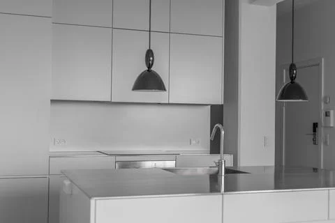 Kitchen Interior with table, sink and tap on it. Stock Photos