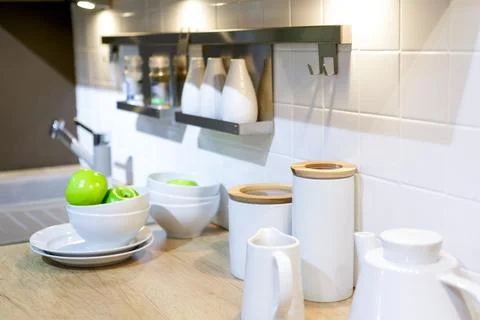 Kitchen interior - table with white utensils Stock Photos