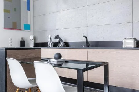 Kitchen with island and table Stock Photos