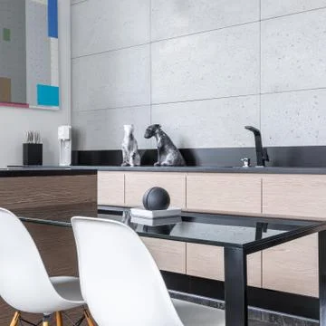 Kitchen with island and table Stock Photos