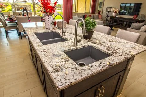 Kitchen Island With Decorator Items &amp; Two Stainless Steel Sinks Stock Photos