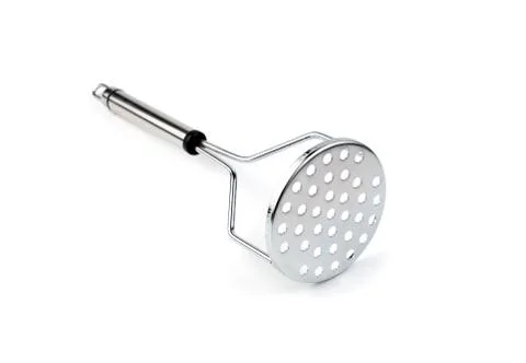Kitchen item for making mashed potatoes on a white background. Stock Photos