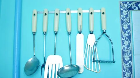 Kitchen knife and spoon Stock Photos