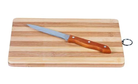 Kitchen knife on a cutting board. Kitchen knife on cutting board. Objects ... Stock Photos