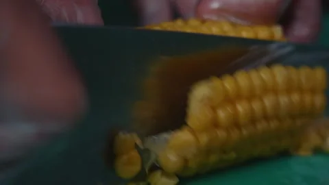 Kitchen Knife Cutting Through Corn Texture, Slow Motion Vídeo Stock 339901797