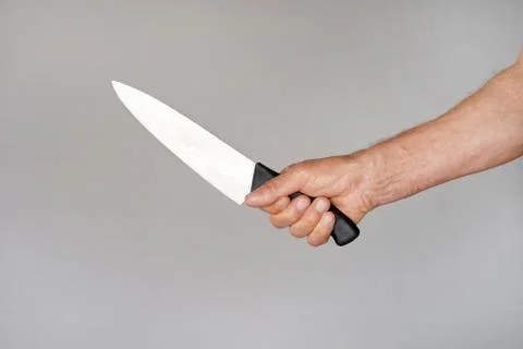 Kitchen knife in a hand Foto stock