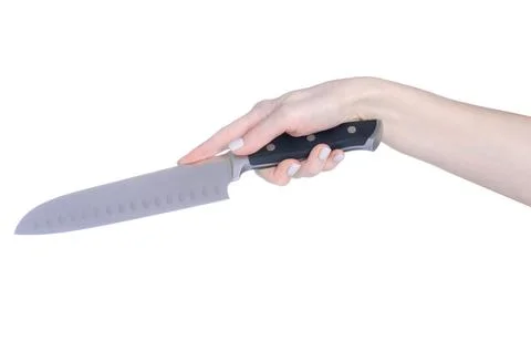 Kitchen knife in hand Stock Photos
