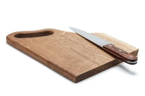 Kitchen Knife Lying On A Cutting Board, White Background Stock Photos