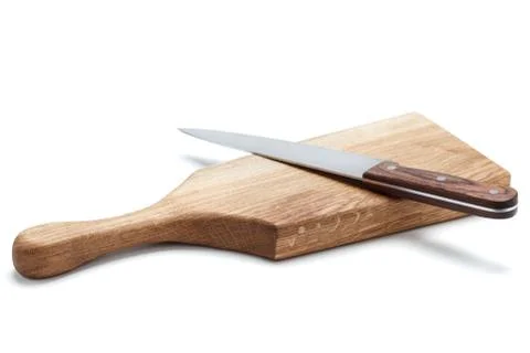 Kitchen Knife Lying On A Cutting Board, White Background Stock Photos