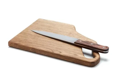 Kitchen Knife Lying On A Cutting Board, White Background Stock Photos