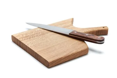 Kitchen Knife Lying On A Cutting Board, White Background Stock Photos