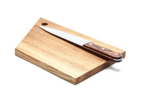Kitchen Knife Lying On A Cutting Board, White Background Stock Photos