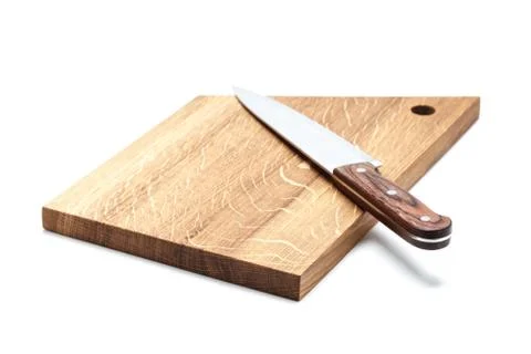 Kitchen Knife Lying On A Cutting Board, White Background Stock Photos
