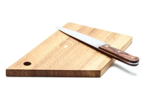 Kitchen Knife Lying On A Cutting Board, White Background Stock Photos